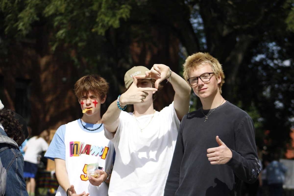 Elias Kirsch, John Gerdes and Miles McDonald pose at the Film Club table at the annual CHS Club Fair, held on Sept. 15. Miles McDonald, Film Club president, created Film Club in efforts to spread the thrill and joy of watching films to others. 
“I'm gonna give this thrill to every single member in Film Club this year,” Mcdonald said. “Mark my words.”
