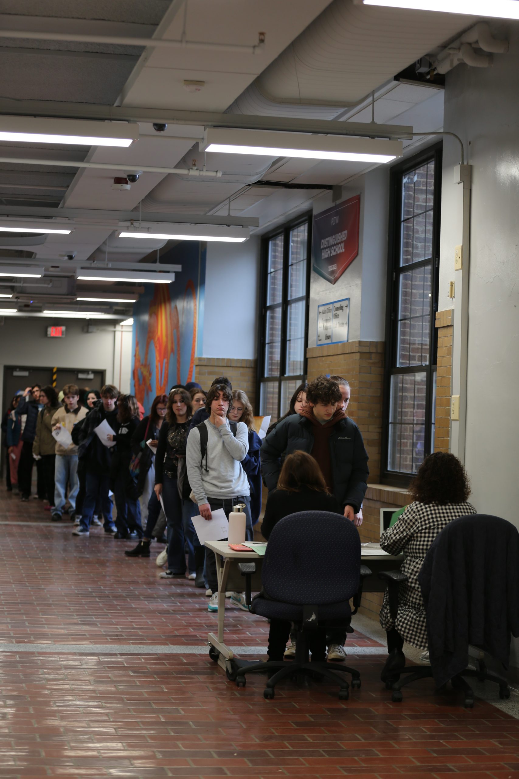 Students line up outside craft theater waiting for their turn to sign up for semester 2 classes. Junior Desmond Lorenz believes planning ahead is the key to coming out of registration with a schedule you are happy with. “I talked to a teacher beforehand, just to see if there was any way I could get a spot in the class, Lorenz said. “But you know, thats just trying to plan ahead because I had a higher number of 107.”