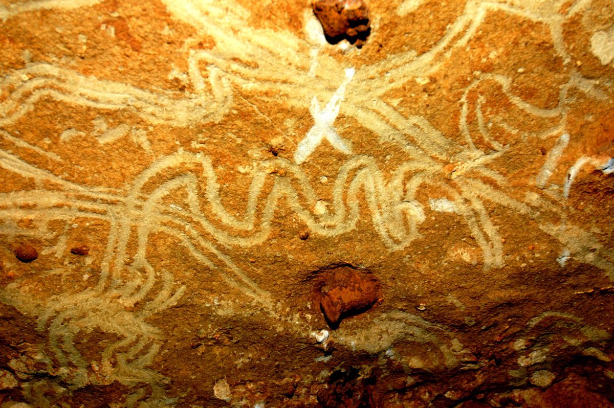 Prehistoric+humans+finger-painted+by+creating+markings+on+the+soft+stone+of+cave+walls.