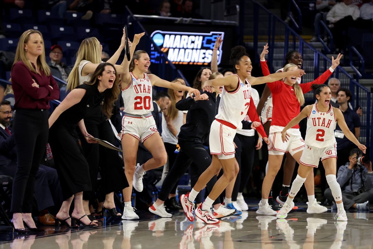SPOKANE, WASHINGTON - MARCH 23: The Utah Utes bench celebrates a basket against the South Dakota State Jackrabbits in the first round of the NCAA Womens Basketball Tournament at McCarthey Athletic Center on March 23, 2024 in Spokane, Washington.  (TNS: Photo by Steph Chambers/Getty Images) 