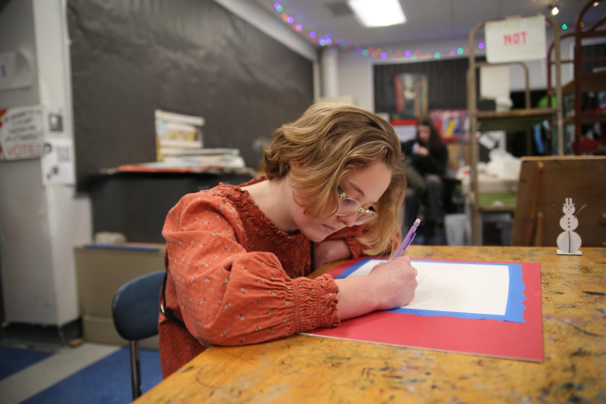 Maggie Williams works on a sketch in the art room. Williams has found that she feels most at peace when she is drawing. “I think I have always liked art,” Williams said. “I like looking at it, I like creating it. It’s just great.” 