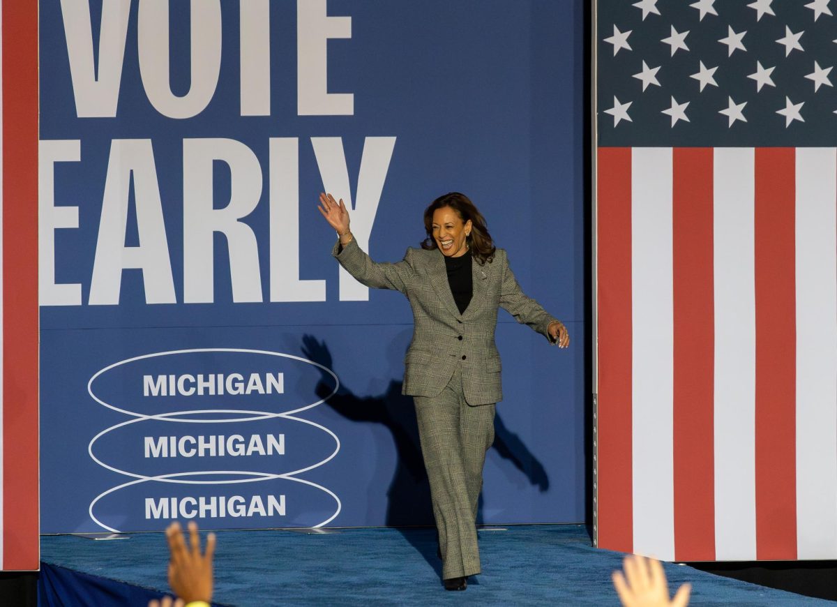 Kamala Harris walks out onto the stage at the rally. She was greeted by uproarious cheers from the audience.