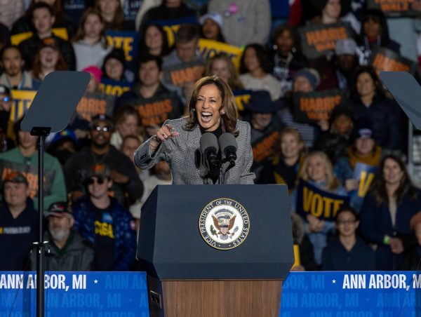 Kamala Harris laughs as she speaks to a spirited crowd on Monday night in Ann Arbor.