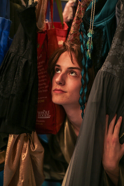 Peeking Through: Luca Hinesman pokes his head through the costume rack during costume fittings as he jokes around with his friends on costume crew. He has always found costumes to be a very big part of his role and always tries to find a costume that showcases both his personality and also the role he is playing. “For me, getting up on stage is always about telling a story,” Hinesman said. “That could be funny, powerful, sad and I always want the audience to leave feeling some way. Costumes play a big role on this aspect of emotion for the audience. Being bold and wearing something that is outside of my comfort zone is always scary, but it really helps the audience understand the plot and it also helps me grow as an actor and learn more about myself.”