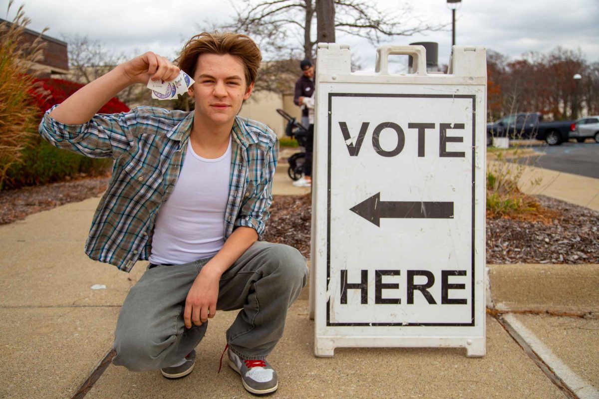 Elliot Mason Poses outside of a polling place. He had just voted for the very first time. 