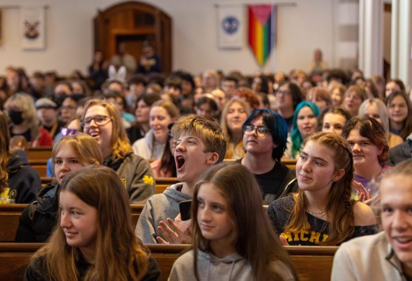 First-year student Ian Rea erupts in cheers as the Kiley Forum announces their total funds raised for Food Gatherers this fall. Rea’s excitement reflects the collective enthusiasm and dedication of the CHS community, whose efforts made this year’s fundraiser finale unforgettable.