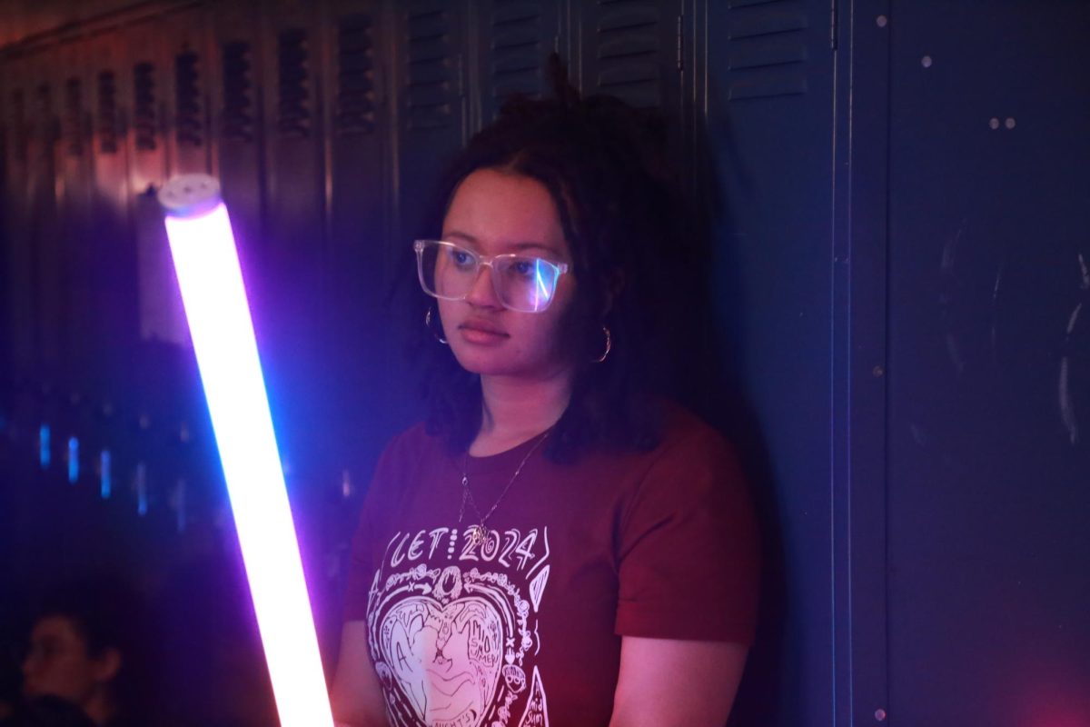 Kai Canara stands against the second-floor locker otherwise known as backstage for the CET Midsummer Night’s Dream. It's Canara's first time on crew and she has the unique job of operating the Titan Tubes. "This is so amazing," Canara said. "I just love watching how everything comes together to make this happen."