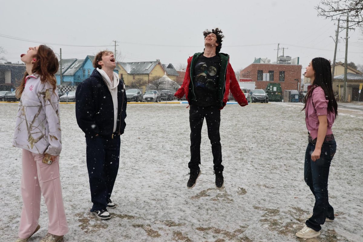 Zane Swerdlow leaps with joy, while excited that it’s snowing finally. Tongue was faced up to the sky as he was trying to trying to get it to land on him. “I am more then happy to be out playing in the snow,” Swerdlow said. “I love catching snowflakes on my tongue more then anything else in the world!”