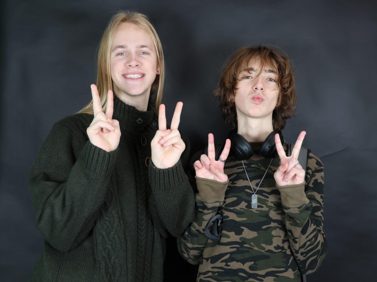 Noah Anderson, a first-year staff member for The Communicator, poses next to Jake Williams, one of three of The Communicator's A&E editors. Anderson primarily works on photography and helping out with The Communicator's Instagram. "My first semester on the communicator staff has been super eye-opening and has impacted the way I navigate my day-to-day," Anderson said. "I’m inspired by everything, and it’s been amazing working with so many talented people."