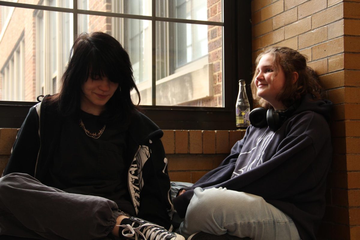 Theo McCready and Tempe Stilverson sit on the second-floor ledge as they chat it up. They both finished a test and had spare time before each of their next classes, so they decided to catch up. "I love Tempe," McCready says. "We have a very similar sense of humor, and he's so much fun to talk to."