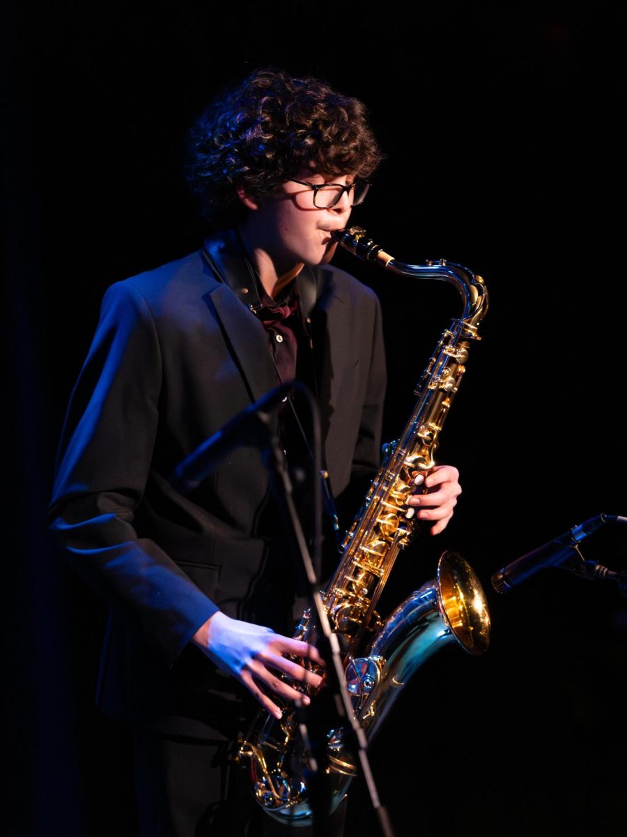 Nic Villamor, a CHS junior and member of a jazz four combo, plays on stage at the Arctic Blast. It was his first solo of the concert. “It was very exciting, and I was also a little scared,” Villamore said. “I think it’s good pressure.”