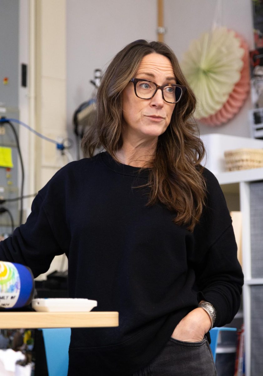 Tracy Anderson explains to her first block journalism class what it means to take an "environmental portrait." She believes the most powerful photos are those that capture people in their environment. "Remember Pete Souza's words: 'You are making a photo,' not just taking one," Anderson said. 