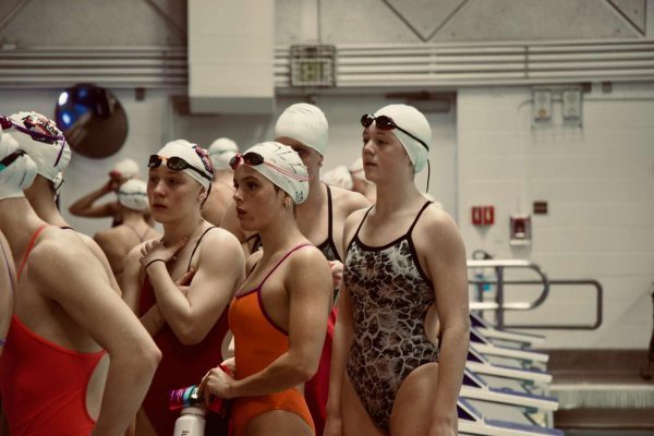 Adrienne Schadler listening to coaches at Olympic Training camp invite.