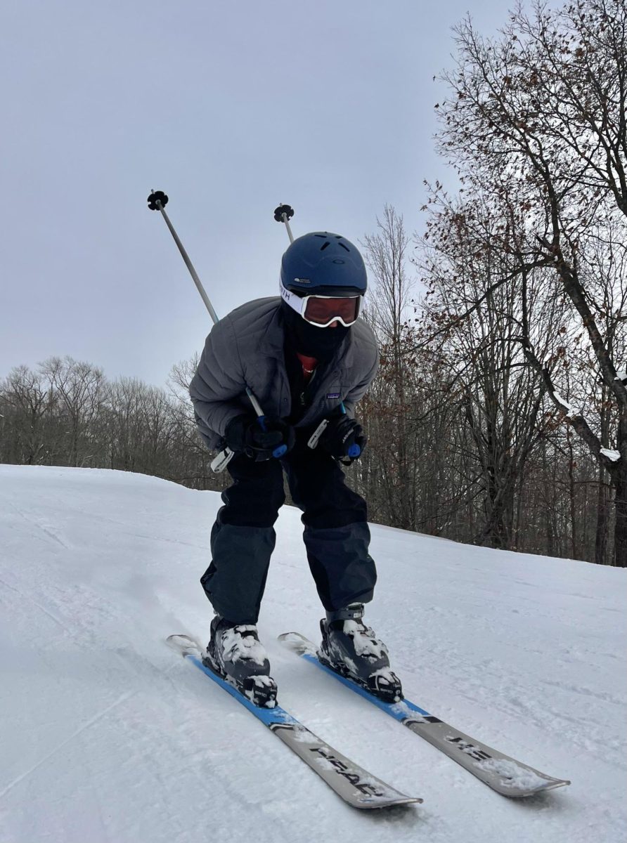 Esh Schaden barrels down a slope at Boyne Mountain. He had come directly from Lake Tahoe, making it his fourth consecutive day of skiing. "I've skied 25 hours in less than a week," Schaden said. "The good thing is there's always new things to try."