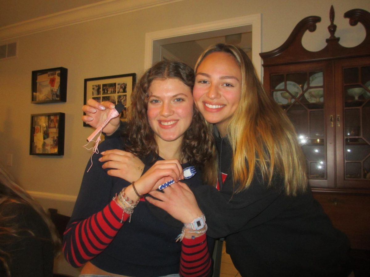 Klava Alicea and Kinga Jung decorate their sporks with string and jewels. The girls got together for a last-minute spork decorating party Monday night. "It was very special to decorate my spork with all my friends," Alicea said. "I really feel like a senior now."