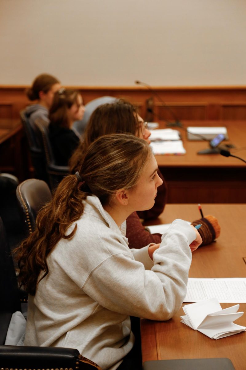 Andrea Skerlos sits at the prosecution counsel table as she watches for objections. As both lawyer for prosecution and a witness for the defense. Skerlos has a tough job of memorizing her character as well as knowing the entire case and the rules of evidence. “I read my witness statements over and over and over,” Skerlos said. “I need to fully know my character and their actions.