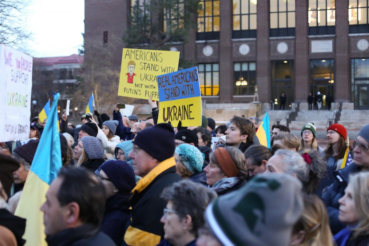 A crowd of observers mark the war in Ukraine's third anniversary by attending a vigil for Ukraine on the Diag. The vigil was directed by Eugene Bondarenko, a Ukrainian native with deep personal ties to the war. “Three years into a war, there's fatigue," Bondarenko said. "Russia's ultimate goals hinge on the fact that people will simply get tired of fighting. Events like this kind of serve as a demonstration that, nope, they’re wrong. I don't know how many years they're going to have to wait, but, you know, Putin biologically doesn't have that many left.”