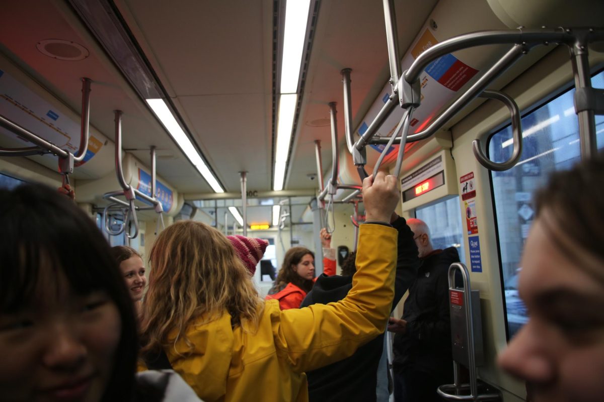 Laurel Landrum and her students ride the Q Line in downtown Detroit.