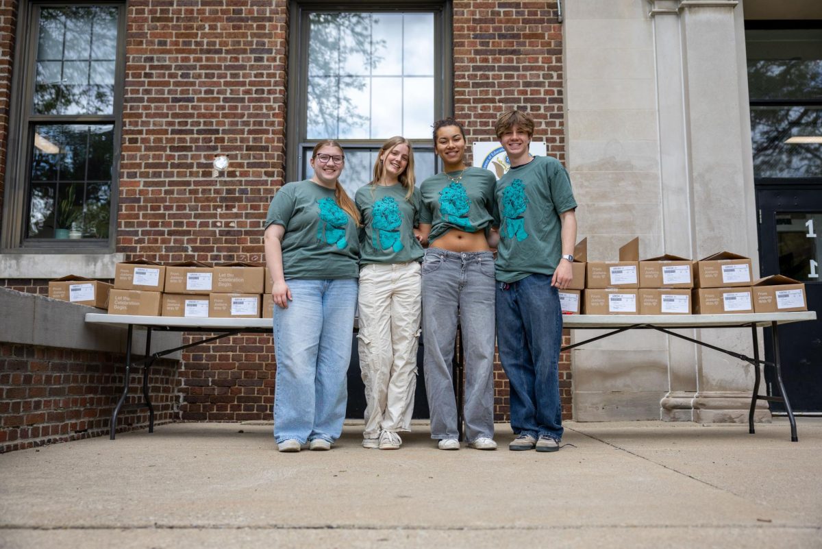 Elle McCreadie (second from left) poses with her fellow yearbook editors-in-chief, Mallory Towers, Jacqueline Boynton and Jack Lewis (left to right). After spending her entire year creating the book, McCreadie couldn't believe it was finally time to distribute it. "I'm so proud of everything we've accomplished through this book," McCreadie said. "This has been the best team of people to work with, and I hope every student loves the yearbook as much as we loved making it."