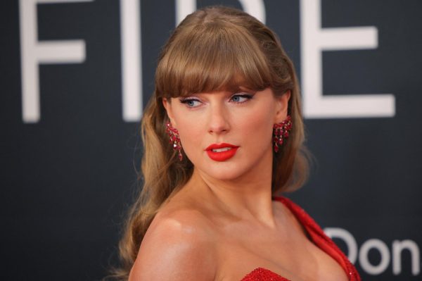 Taylor Swift poses at the red carpet during the 67th Annual Grammy Awards in Los Angeles, California, U.S., February 2, 2025. REUTERS/Daniel Cole