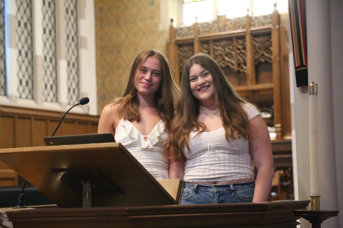 Ava Griffith and Piper Cooke stand at the podium, in front of the CHS student body. They were preparing to introduce the goals of Forum Council for the upcoming year. "I'm so glad I'm Vice President this year," Griffith said. "I have so many ideas for the school."