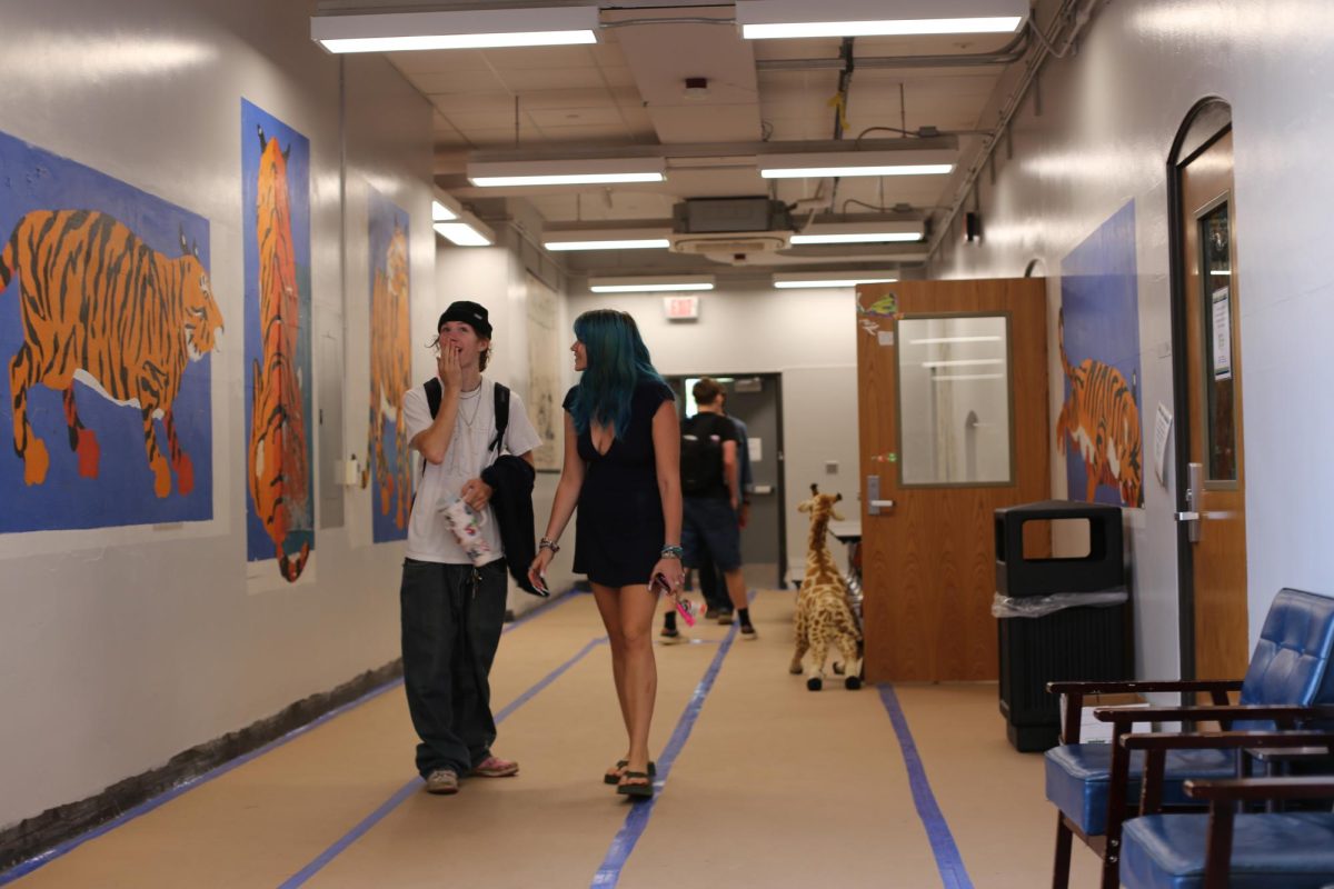 Sarie Andes and Max Rosewig walk through the hallway together for their fifth block class. The pair have majority of their classes together, and they prefer it that way. "We're always together," Andes said. "I mean that's what best friends do!"