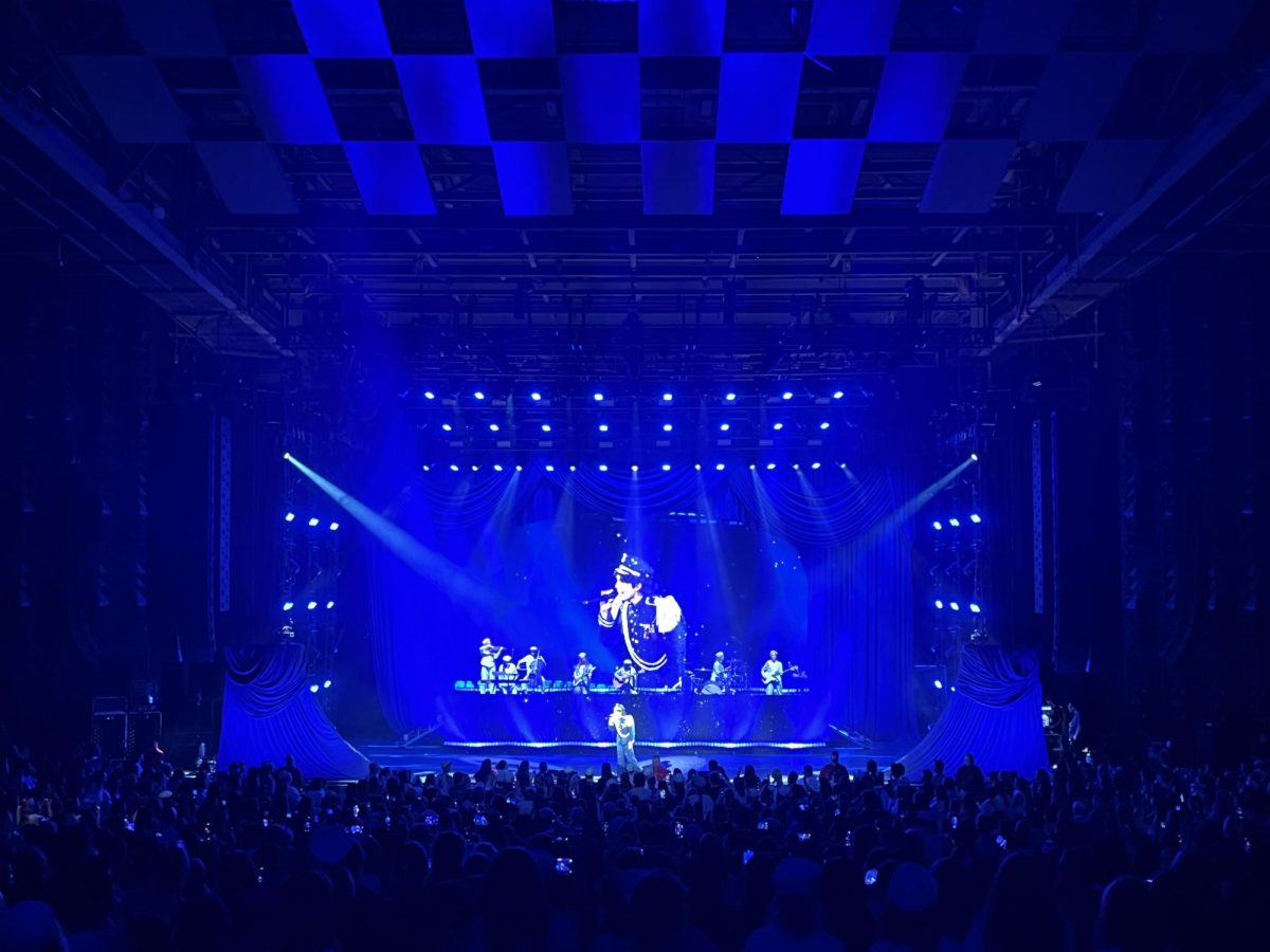 Conan Gray sings his final song, "Caramel," to the crowd during the encore of the show.