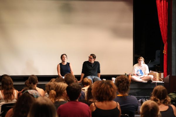 Students listen to Emily Wilson-Tobin give information on how to join the cast of "Fahrenheit 451."