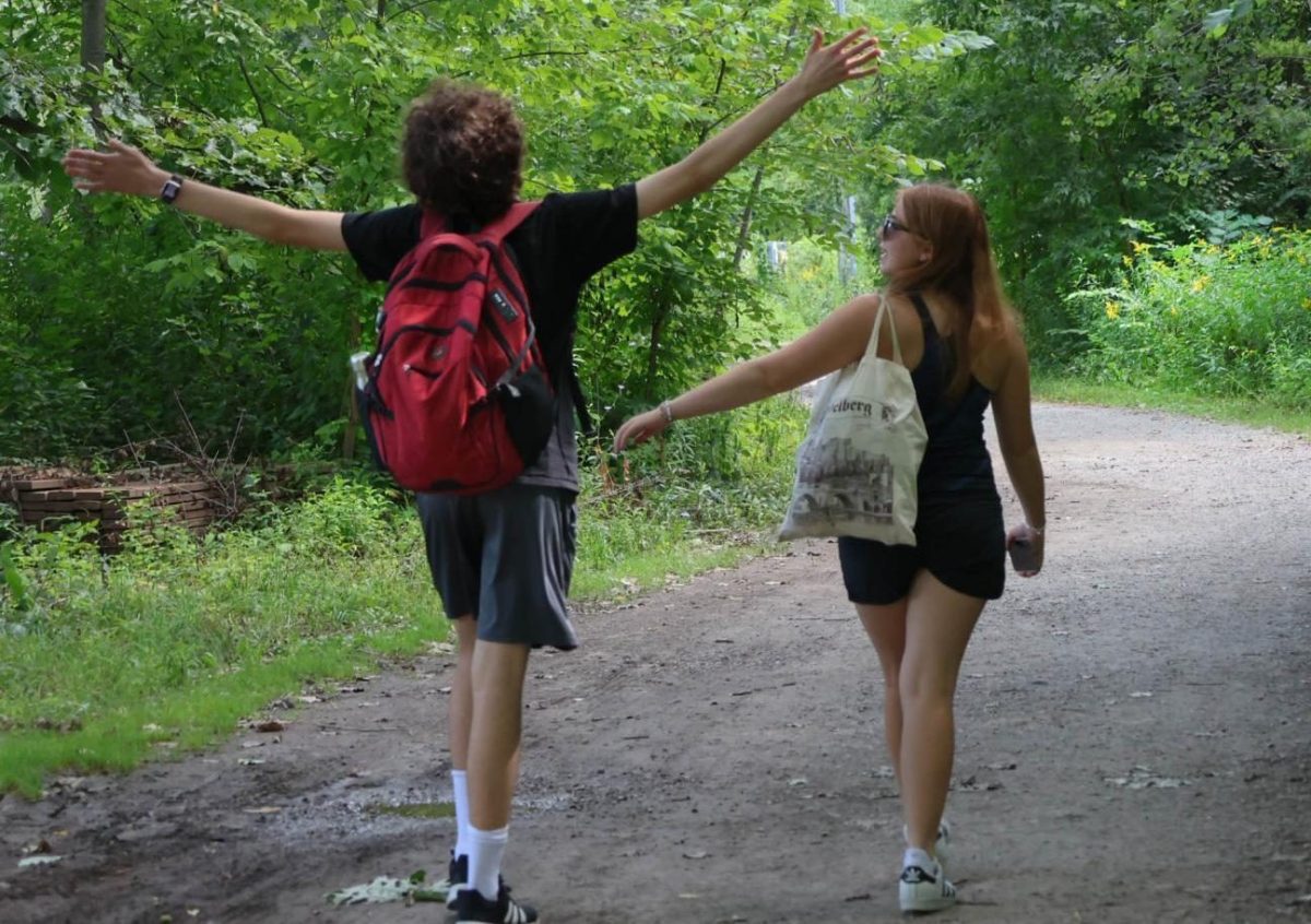 CHS Senior Nic Villamor and Sophomore Liliana Amjadi-Klass take a walk through Nichols Arboretum.