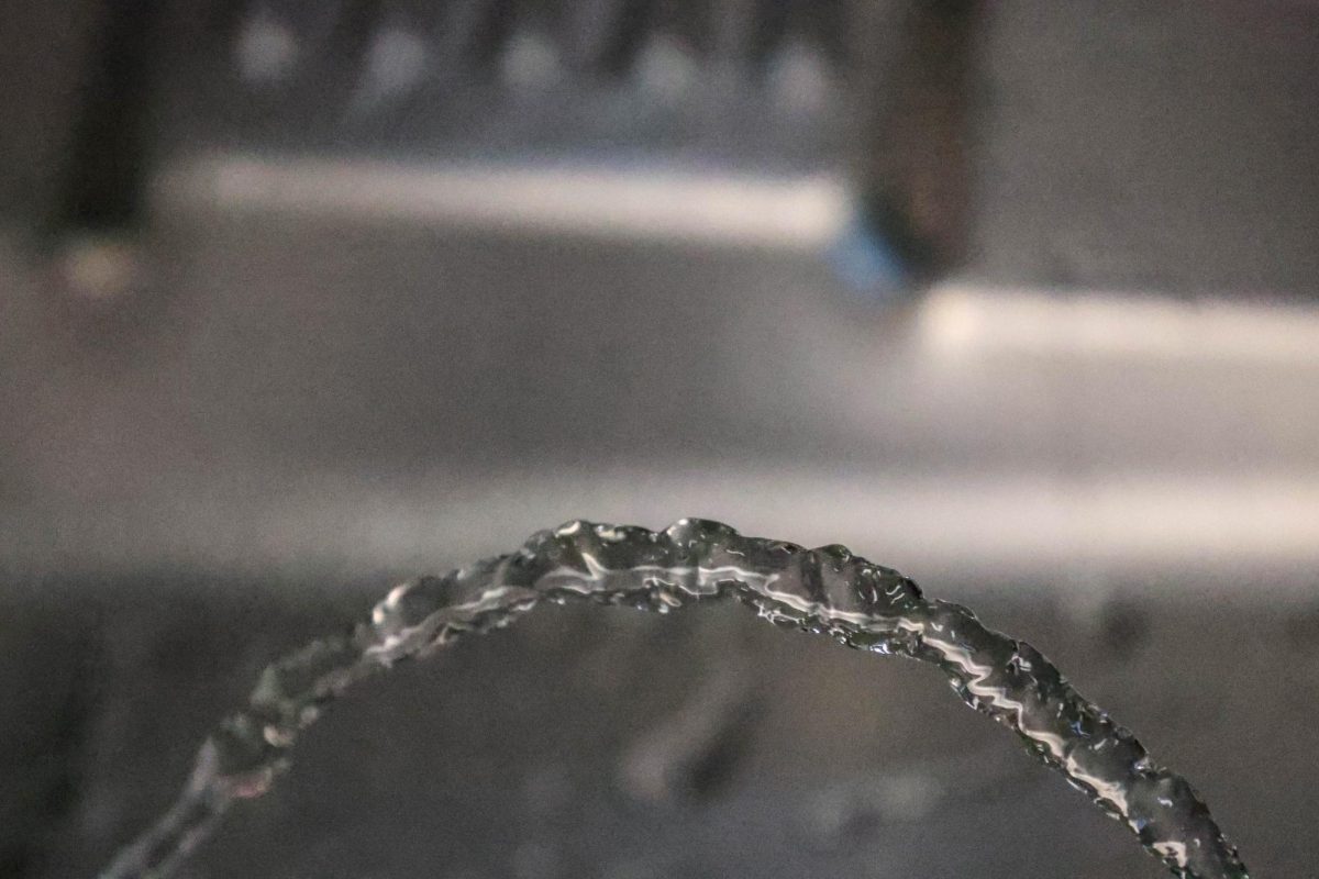 Clean water flows from a drinking fountain at Community High School