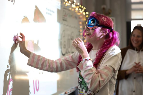 Caitlin Smith plays pin the nose on the mole for Mole Day in their 6th block science class. Smith noted that Marcy McCormick dressing up as a mole was the best part of Mole Day. “I have a math test next week, and all these things happening,” Smith said. “It's pretty good to have some relaxing time and just chit chat with my friends and have a grand old time, especially because I understand the material pretty well, so I didn't feel the need to have an intense study day.”

