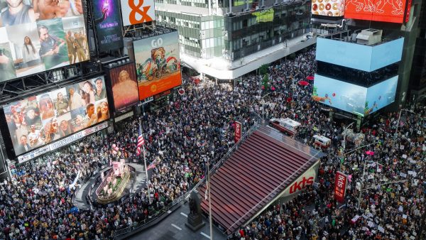 Thousands of protesters fill Times Square during a "No Kings" protest Saturday, Oct. 18, 2025, in New York. (AP Photo/Olga Fedorova)