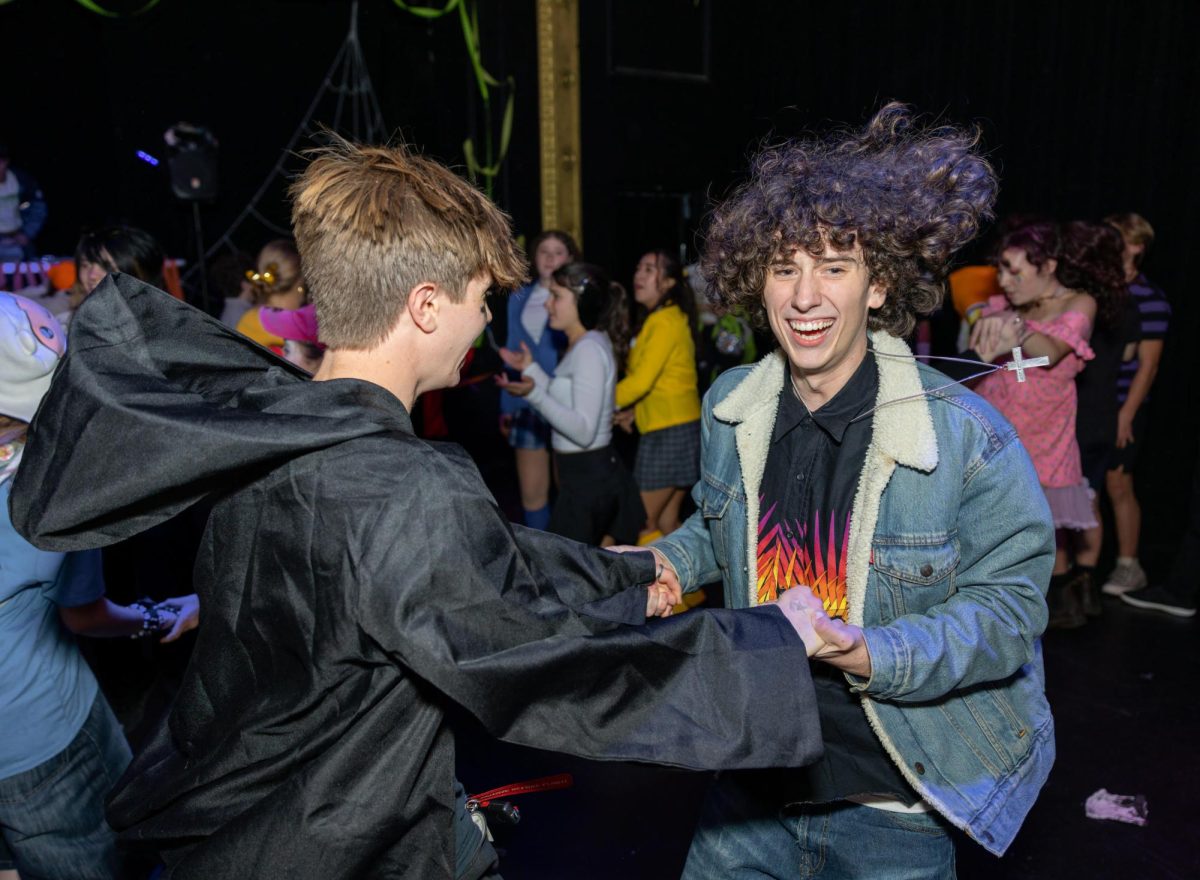 Seniors Jack Lewis (Left) and Milo Varnum (right) dance with unstoppable energy at the annual CHS Halloween dance. For Varnum, the night carried extra meaning because it was his final dance. “I didn’t really go to the other years dances, I don't know why I just thought it wasn't worth my time,” Varnum said. “I thought, it’s my last year, so why not go all out?”