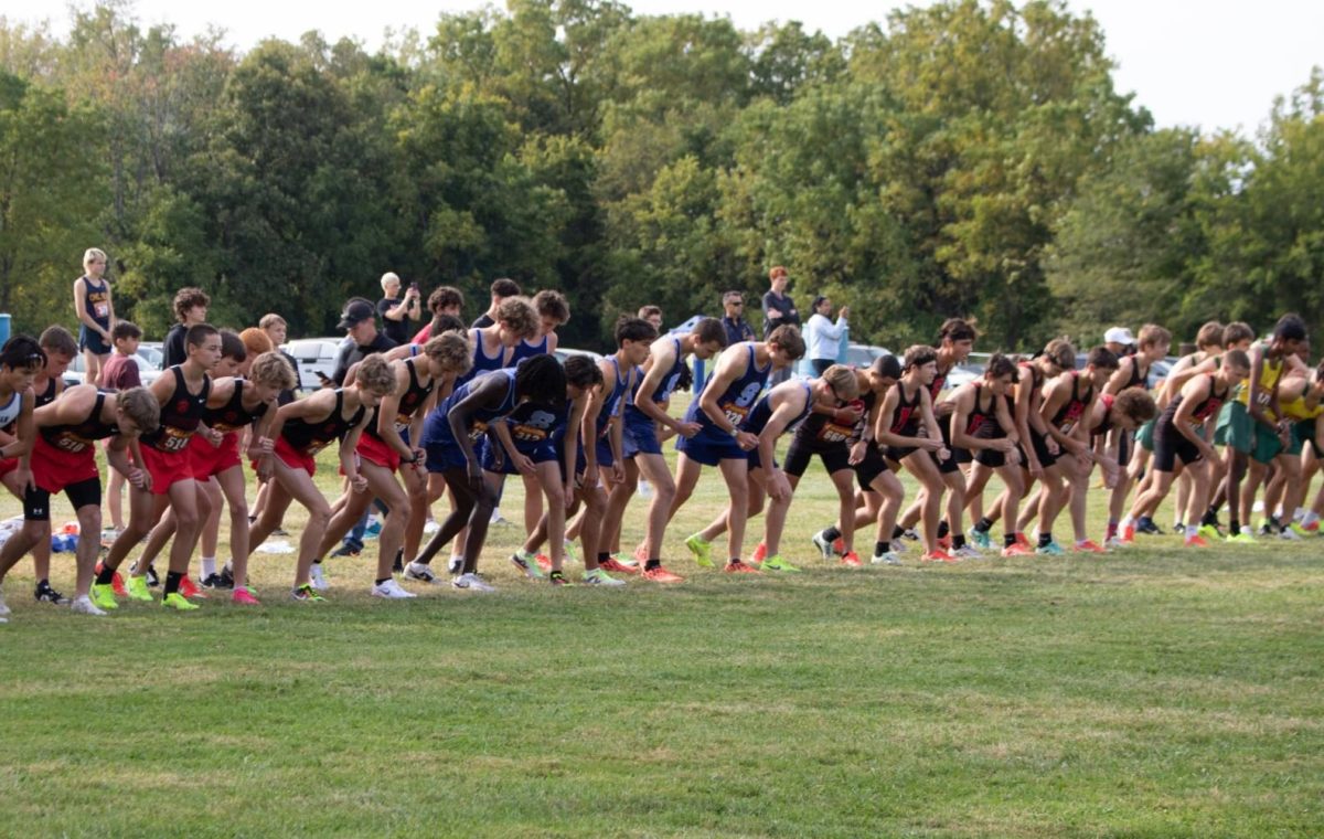 Skyline boys tense at the starting line,
ready to launch into the race. Muscles ready, every mind is set on the challenge ahead. “It’s all about staying calm and focused right before the gun,” Lafferty said.