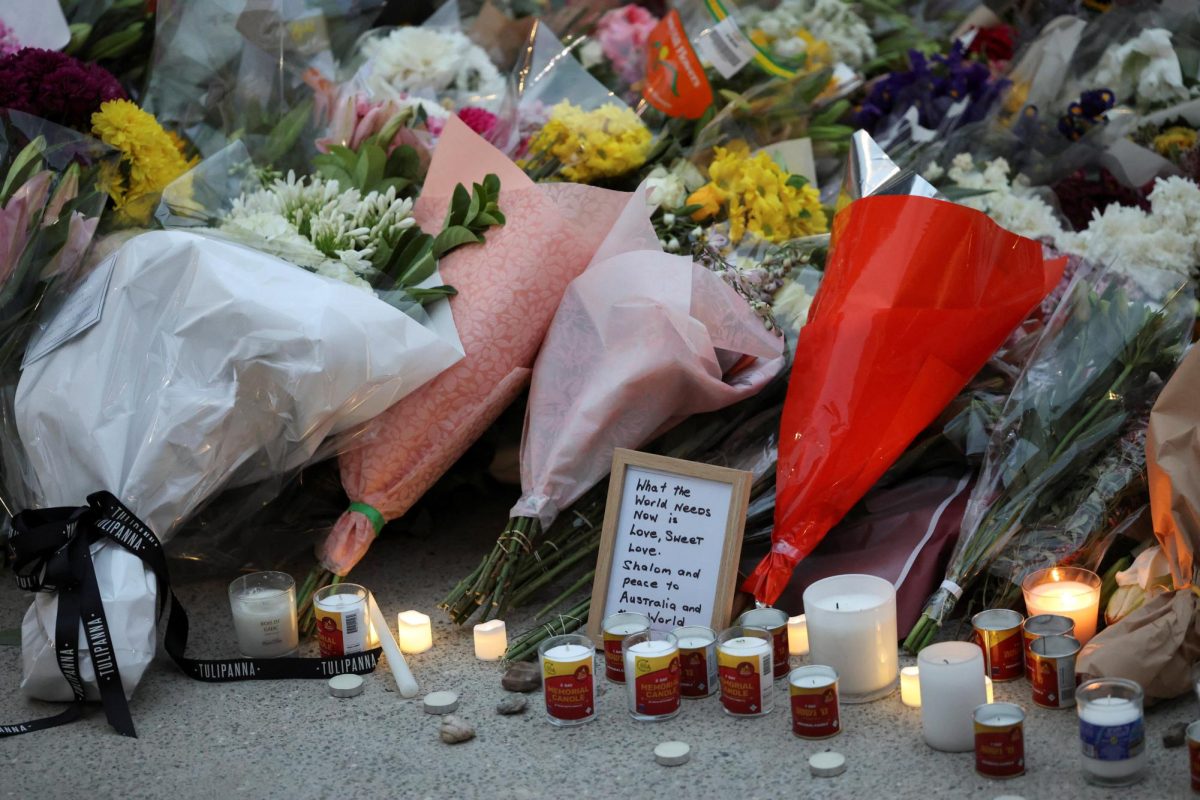 Floral tributes are laid at Bondi Pavilion to pay respect to the victims of a shooting during a Jewish holiday celebration at Bondi Beach, in Sydney, Australia, December 15, 2025. REUTERS/Hollie Adams