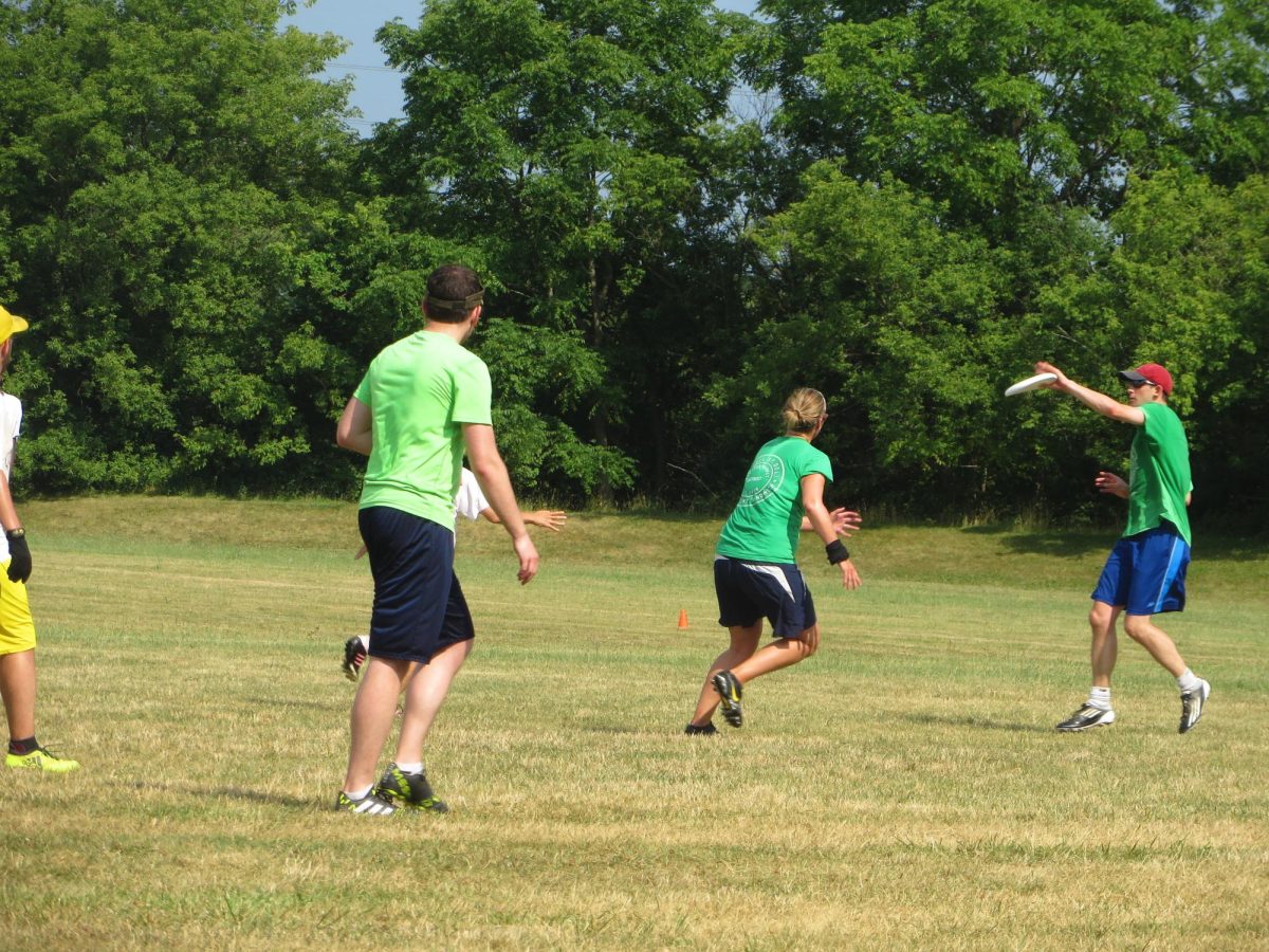 Marcy McCormick runs down the field with her teammates. During one of her Ultimate frisbee games, McCormick isn't thinking about wether or not her team will win, she is thinking about how great she feels to be outside playing a fun game with some of her friends. “To me, it means positivity, respect and inclusivity,” McCormick said. “Everyone supports each other regardless of skill level. You're not only cheering for your team but for the other team too.”Photo courtesy of Marcy McCormick.
