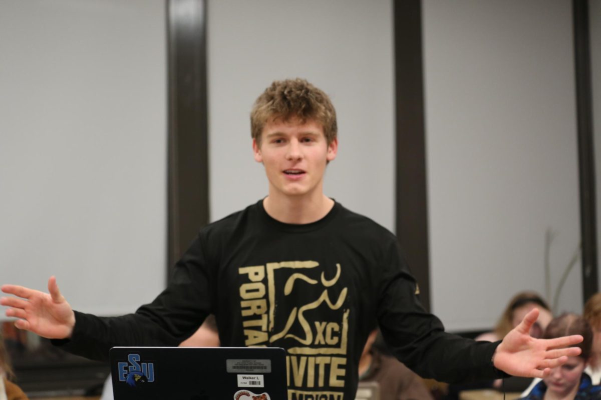 Walker Ledbetter practices his opening statement for this year's Mock Trial case.