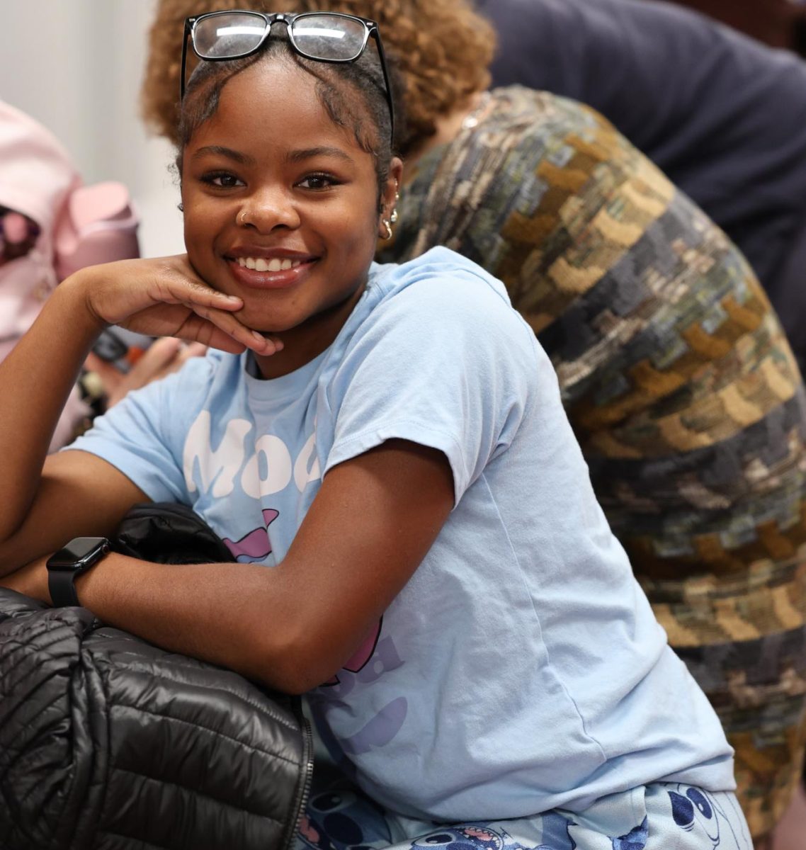 Akavayia Pressley-Dykes sits on the first floor in her "Lilo and Stich" themed pajamas on pajama day at CHS. "I love pajama day because I literally can wear whatever I want and I can be comfy all day at school," Pressley-Dykes said. "I think PJ day is my favorite spirit day out of all of them."