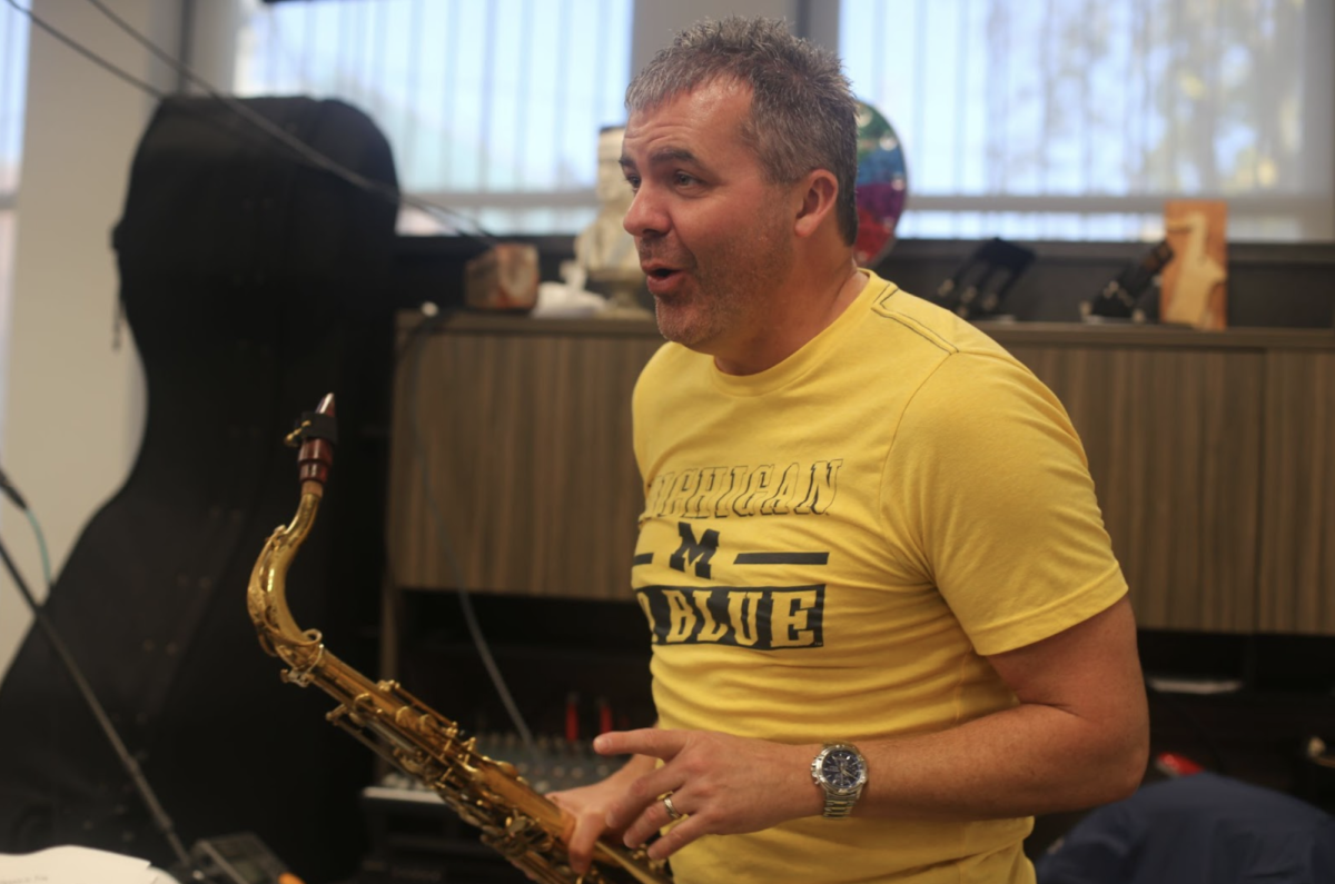 Jack Wagner explains music theory to his class.