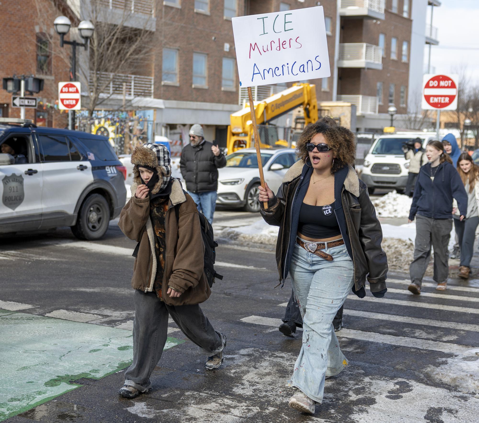 Kai Camara marches toward the Federal Building on North Fifth Street in Ann Arbor alongside hundreds of other CHS students during a district-wide school walkout protesting Immigration and Customs Enforcement (ICE). Camara led the walkout by starting the first chant, “This is what America looks like,” which was followed by “This is what democracy looks like.”