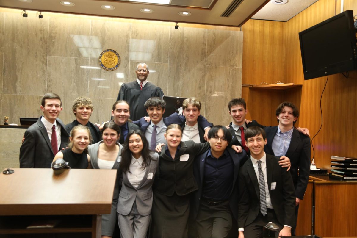 The Mock Trial A team poses for a photo after competing at regionals. 