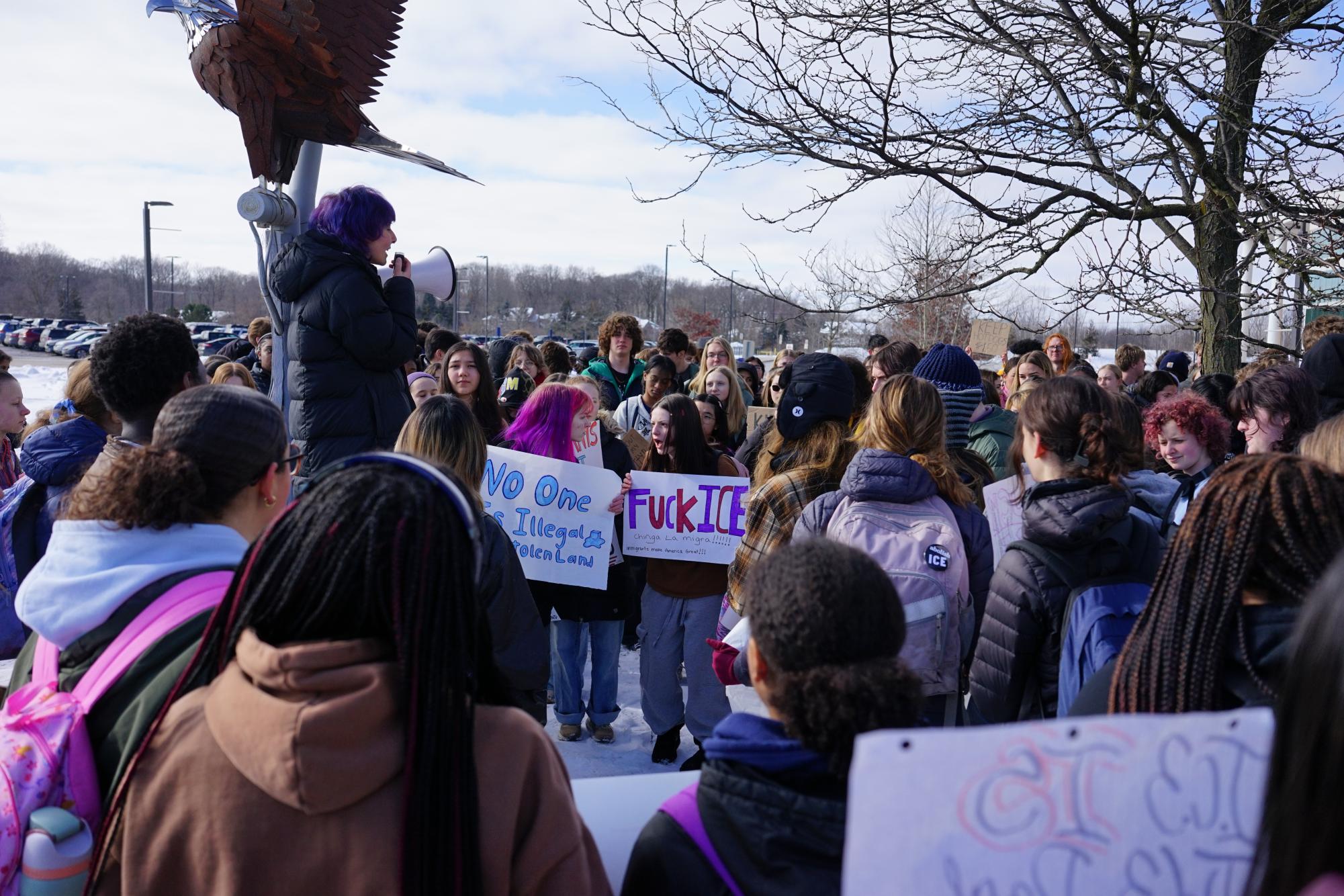 Photo courtesy of Joowon Lee.

Skyline students gather around the eagle statue during their walkout.