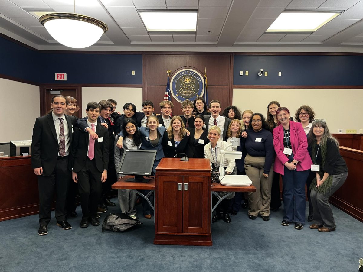 The CHS Mock Trial team stands in the courtroom after winning States. The group had to compete in five separate rounds. "It was truly a team effort," 
Captain Kaylee Gadepalli said. "From the parents who drove us there to the people supporting us back home, everyone came together to support us."