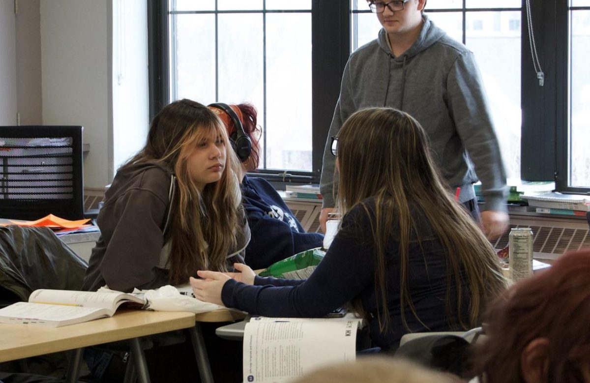 Isla Carlson and Maizy Tavernit catch up during break in math class. Geometry is great class for Carlson and Tavernit. Coming into Community High School from the same middle school, they've made a great effort into keeping that close connection. Geometry is always their time to chat about all the events going on in their lives. "Maizy is a really good friend and we always have our own time during geometry," Carlson said. "Even though the location has changed, I'd like to say our friendship hasn't."