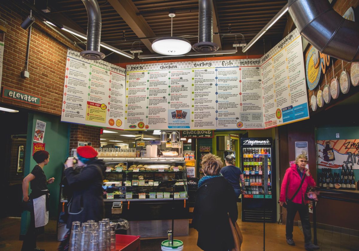 Customers fill the center of Zingerman’s Delicatessen in Kerrytown as visitors line up to place orders at the iconic Ann Arbor restaurant.

Photo Courtesy of Zingerman's Delicatessen. 