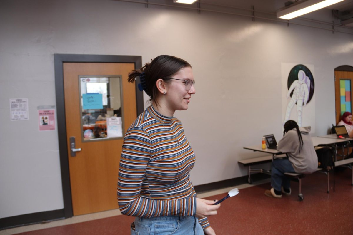 Venus Stolerow stays on guard during the senior spork game. She had been having a conversation, but wanted to make sure not to leave her spork behind. "The spork game is a once in a lifetime thing," Stolerow said. "It's a lot of fun, and I want to make sure I don't lose."