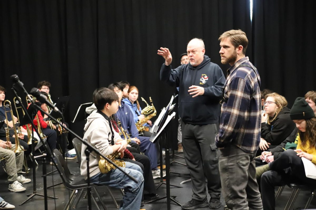 Kenny Rampton gives feedback to the Huron Jazz Band during a Master Class at CHS. Rampton started playing in the 1990s with Ray Charles and has gone on to do an eclectic mix of music. "Over the years, I spent a lot of time doing Broadway shows, doing a lot of television," Rampton said. "I'm currently working for Sesame Street, I've been doing the music for Sesame Street for around 16-17 years."