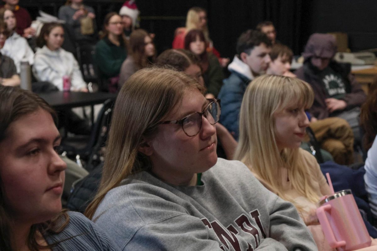 Mallory Towers listens intently to Janet Selcer, CET's guest speaker. CET gathered to hear about Selcer's past experiences as a women's rights activist and grassroots organizer. "It was intresting to hear how the story we were portraying on stage reflects aspects of real life experiences," Towers said.