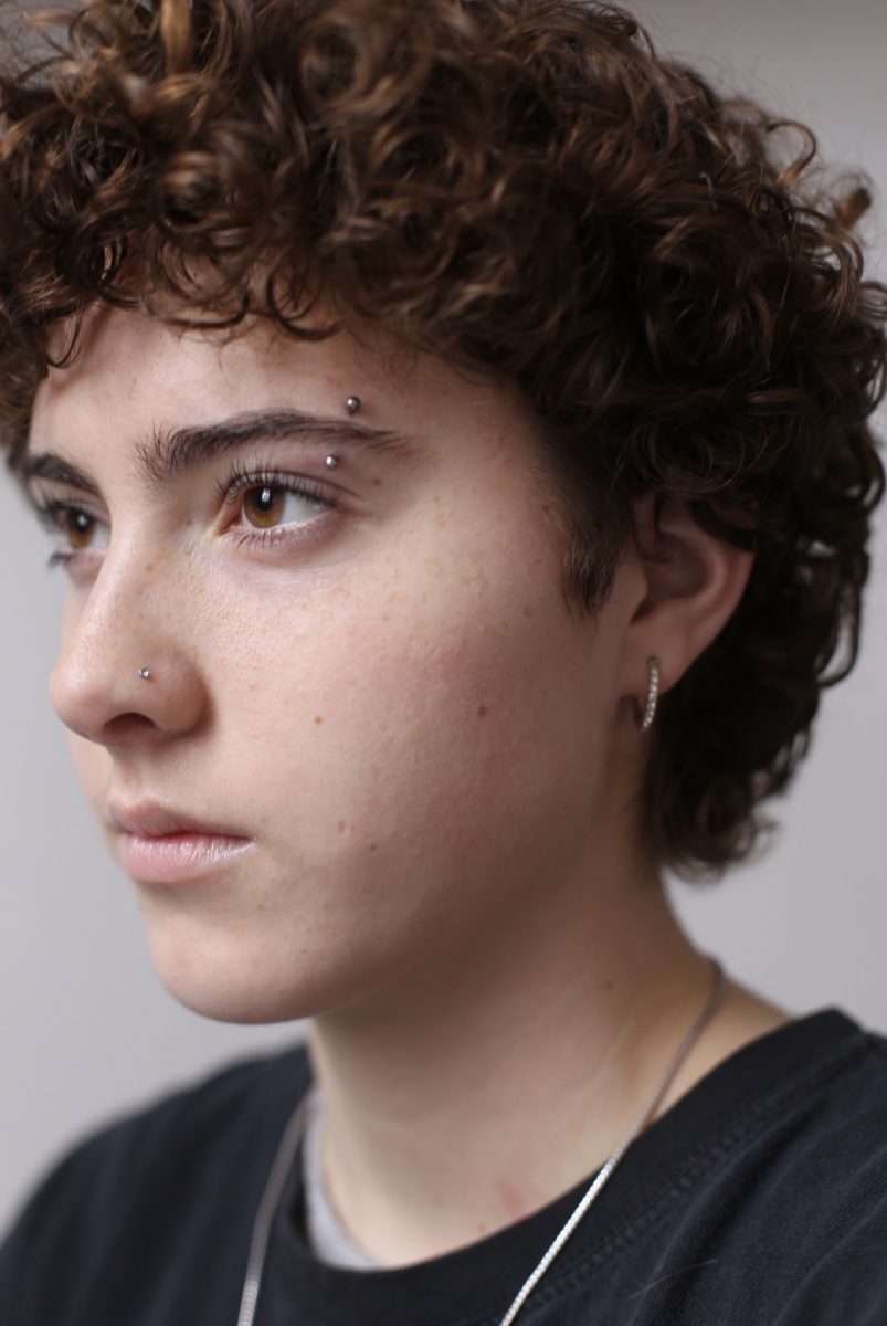 Sam Magee show off her eyebrow, nose and ear piercings. "My eyebrow piercing was a spur-of-the-moment desicion," Magee said. "I got to the piercing shop and just said 'lets do it.'"