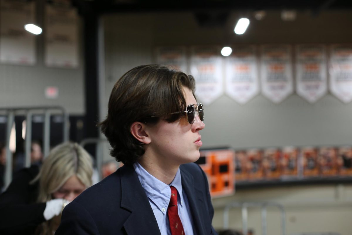 Thomas Radesky looks out on the court wondering if his team is going to advance. Radesky was waiting for the HOSA awards cermeony to begin. "I wasn't expecting to win," Radesky said. "I was very happily suprised."